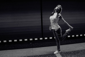 girl standing on 1 leg