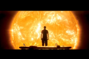 man is standing in front of sun