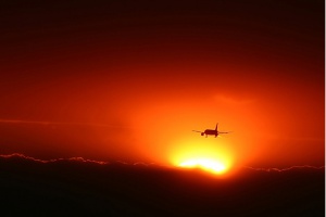 plane infornt of sun