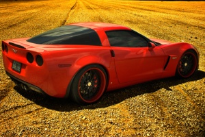 red ferrari in a field